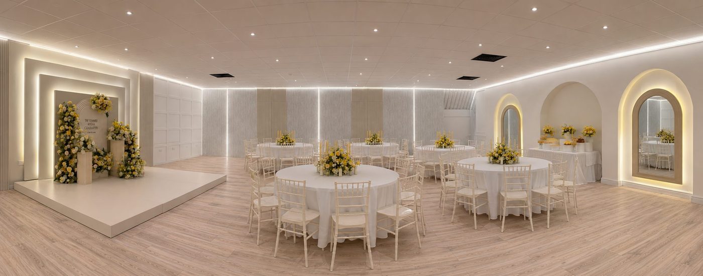 The XL Suite dressed for a summer graduation, round tables and florals